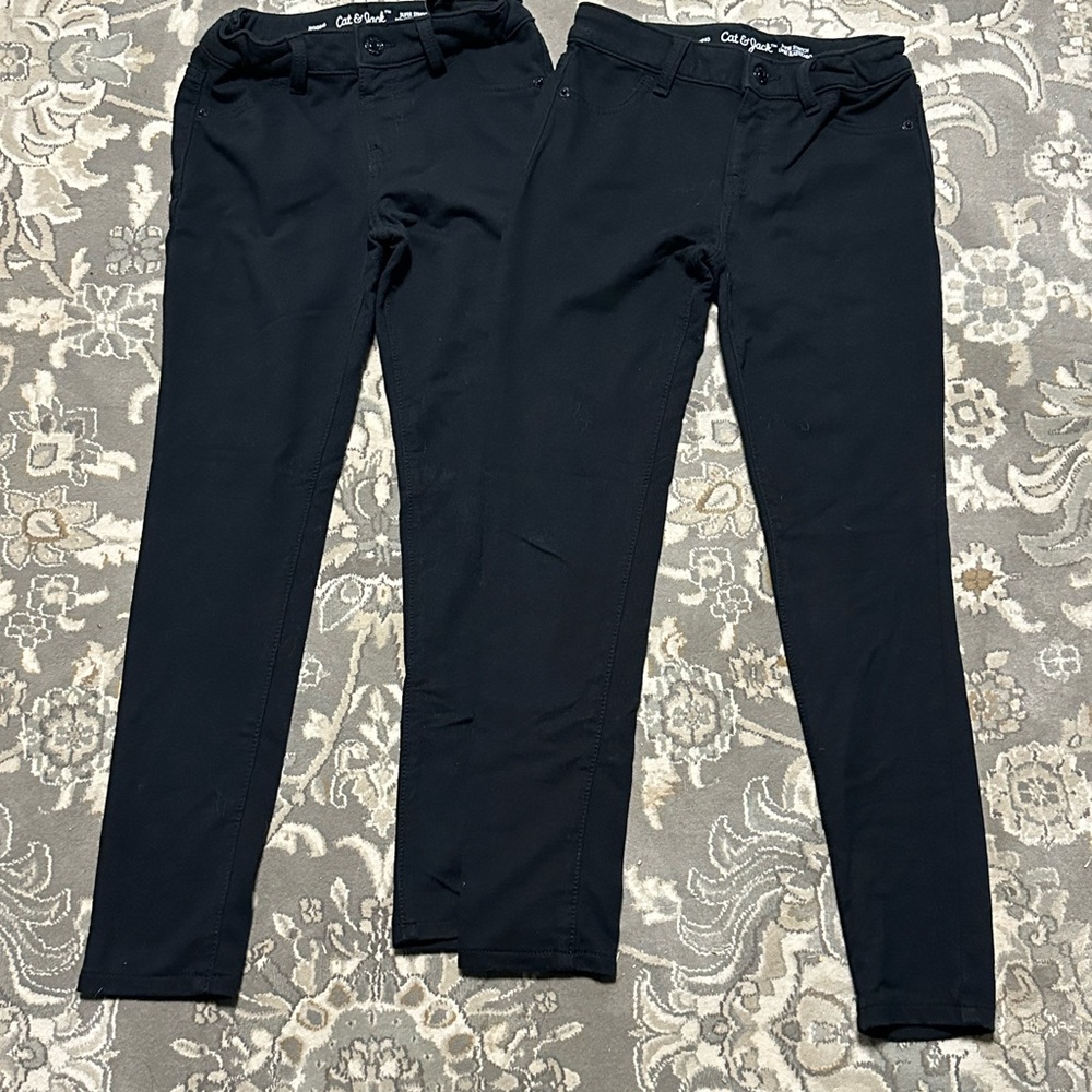 Two pairs "Cat & Jack" pants with five-pocket styling